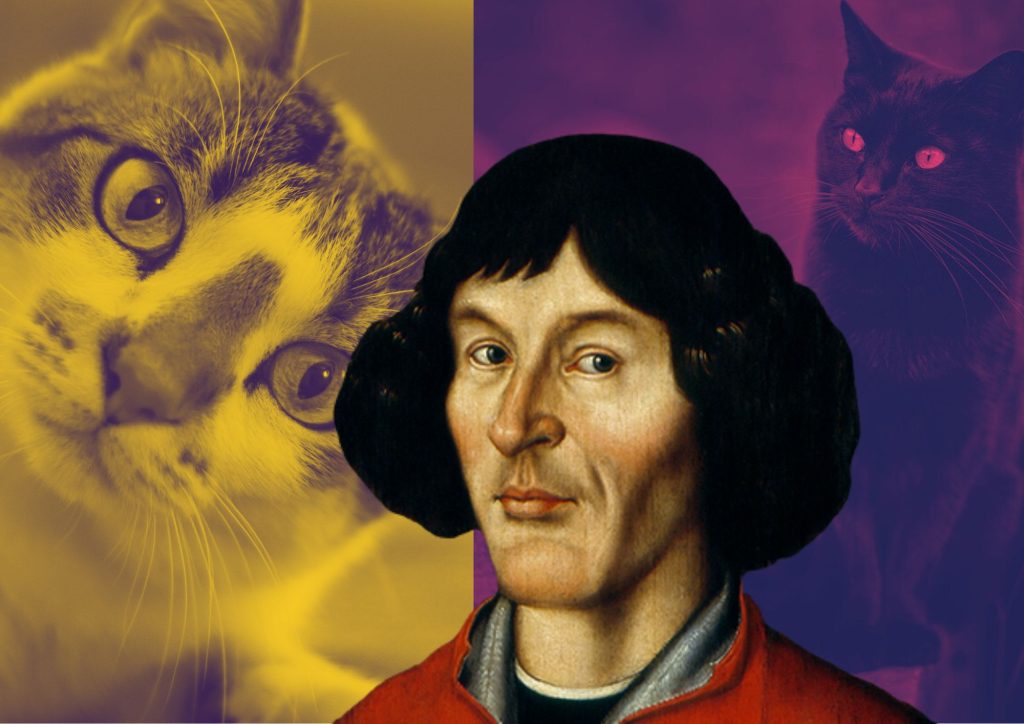 Portret mężczyzny z dwiema kotami w tle.