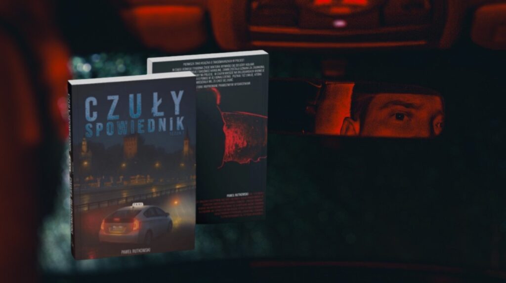 Okładka książki 'Czuły Spowiednik' w samochodzie.