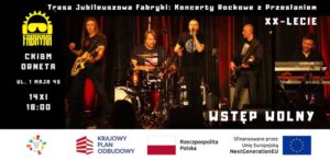 Zespół muzyczny grający na scenie podczas koncertu.