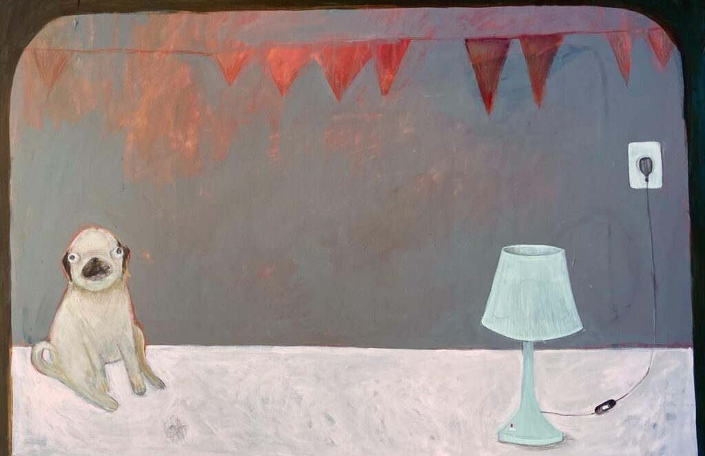 Niecodzienny obrazek z psem i lampą.