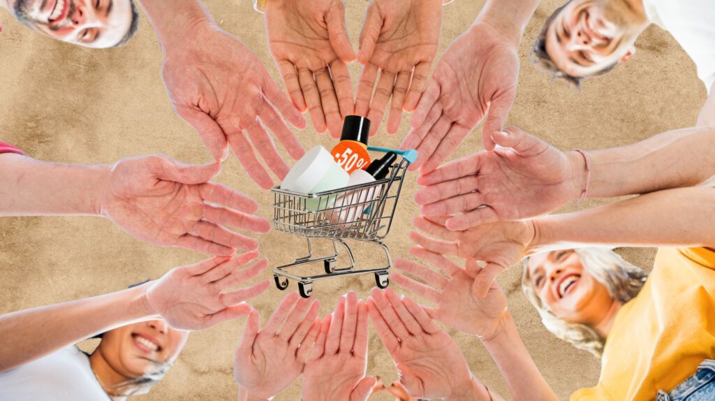 Grupa rąk otaczająca wózek z kosmetykami