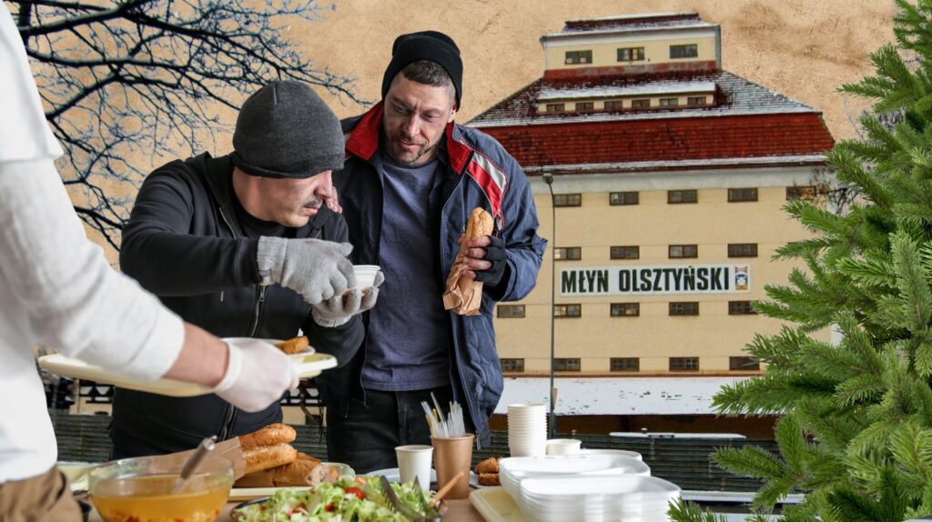 Mężczyźni jedzący posiłek w zimowej scenerii