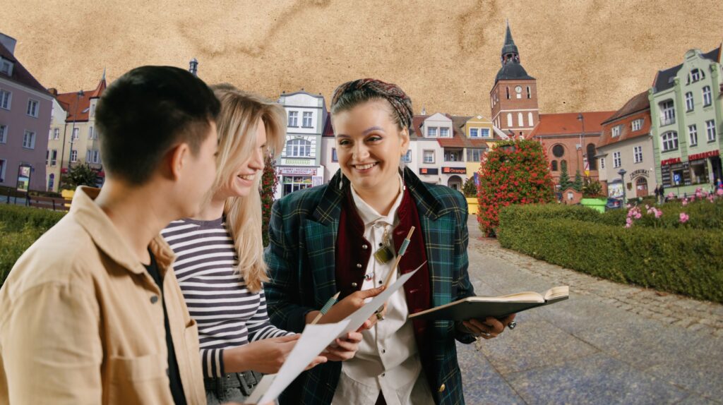 Trzy osoby na spotkaniu w mieście.