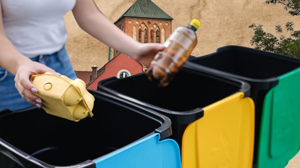 Osoba segregująca odpady do kolorowych pojemników.