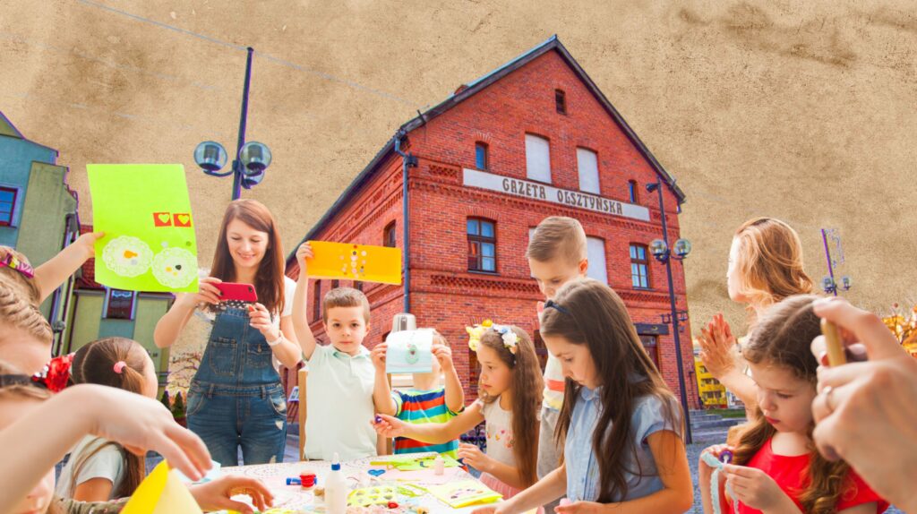 Dzieci bawią się w plenerze, wykonując prace plastyczne.