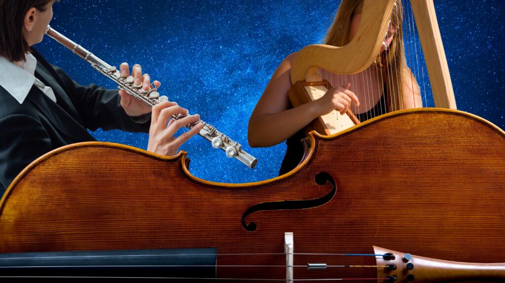 Muzycy grający na flecie i harfie.