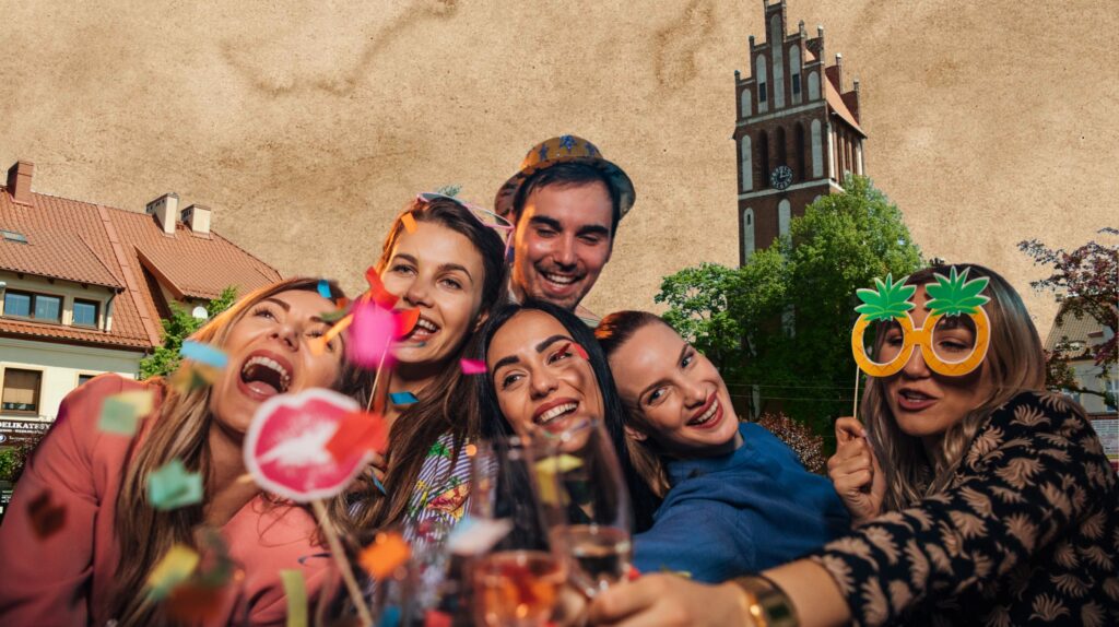 Grupa przyjaciół świętujących z konfetti.