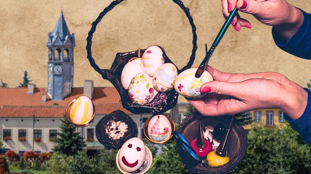 Ręka malująca pisanki przy koszyku.
