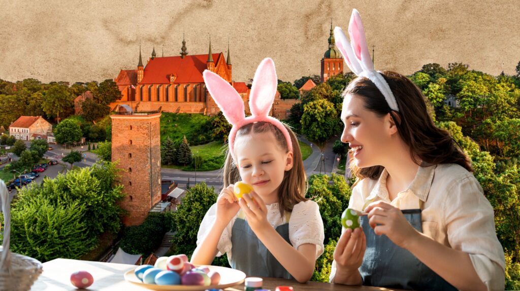 Matka i córka malują pisanki w wiosennej scenerii.