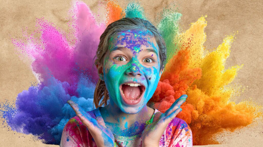 Dziewczynka z kolorową farbą na twarzy.