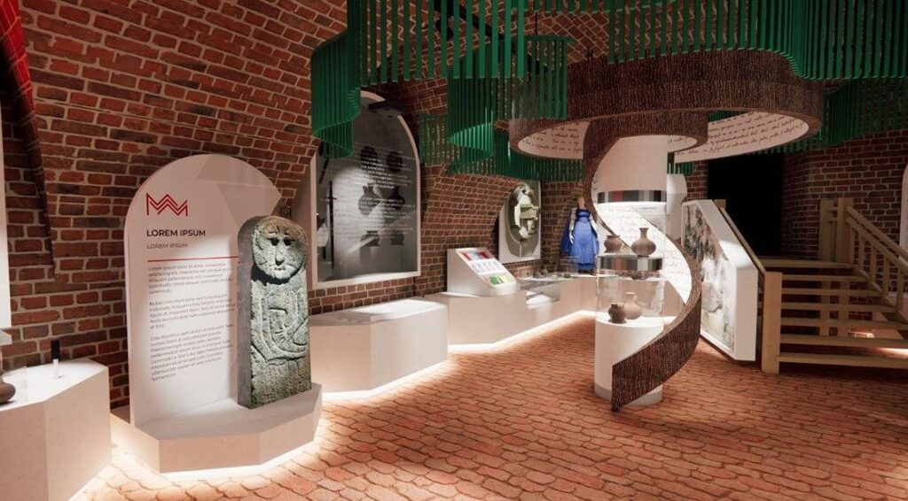 Wnętrze muzeum z eksponatami i informacjami.