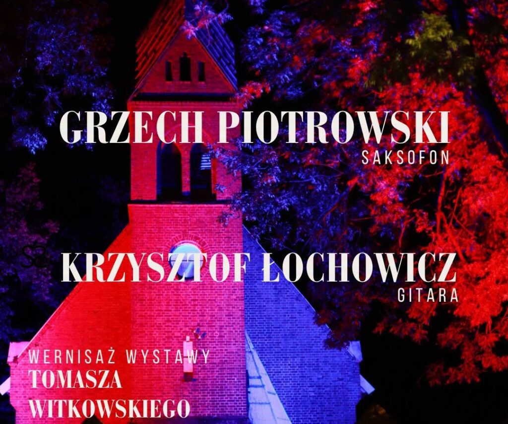 Zabytkowy kościół iluminowany kolorowymi światłami.