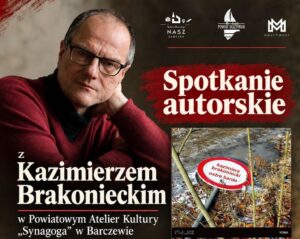 Portret mężczyzny w okularach z czerwonym swetrem.