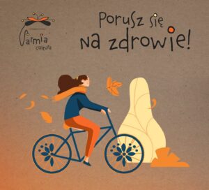 Kobieta na rowerze w jesiennej scenerii.