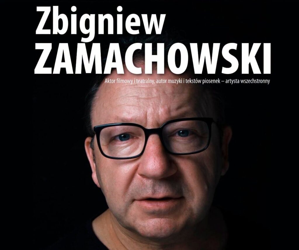 Portret Zbigniewa Zamachowskiego na ciemnym tle.
